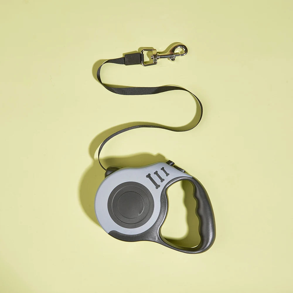 Correa retráctil automática de nailon para perros.
